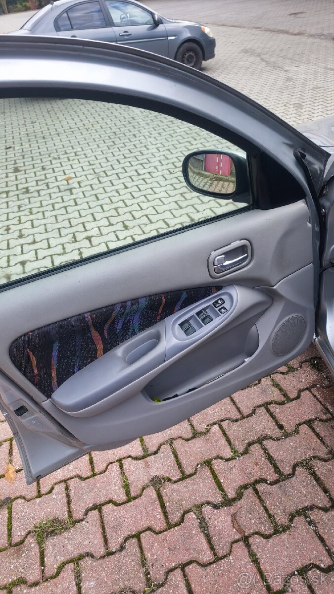 Nissan Almera 1.5 dci - 12