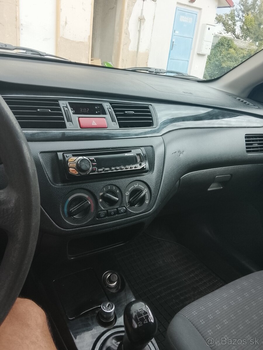 Predám mitsubishi lancer - 12