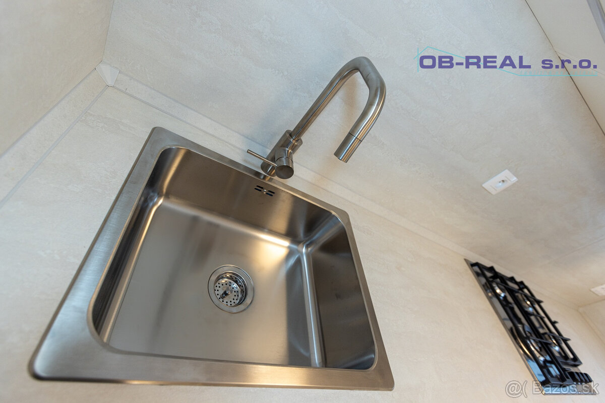 Predaj kompletne rekonštr. 2izb bytu 62m2 na zvýš. prízemí - 12