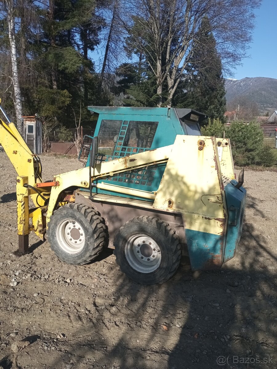 Šmykom riadený nakladač Daewoo - 12