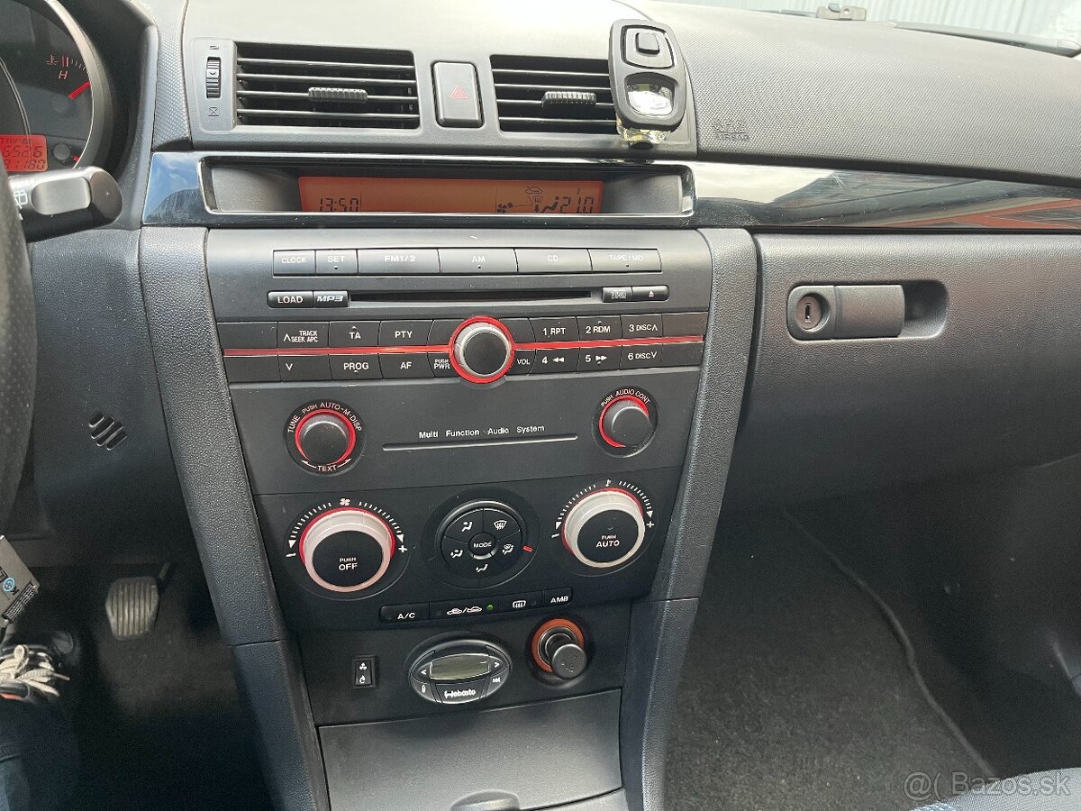 Mazda 3 1.6i. 77kW rok 2005 - 12