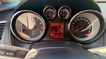 Opel astra j 1,4 74kw - 12