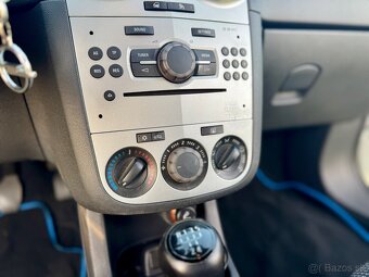 Opel Corsa D 1.2i - 12