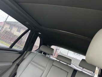 BMW X5 e70 4.8i - 12