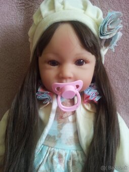 Realistická bábika s oblečením Ľadové káľovstvo - 12