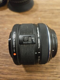 Olympus 17mm, 14-42mm, nikon 50mm - 12