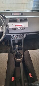 Suzuki Swift 1.3 GLX - 12
