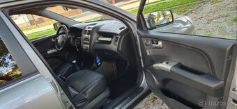 Predám SUV  Kia Sportage 4x4 2.0 TDI 103kw - 12