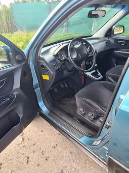 Hyundai TUCSON 2.0 benzín 4x4 165 000km - 12