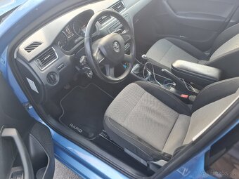 Škoda rapid 1.6TDI 77KW - 12