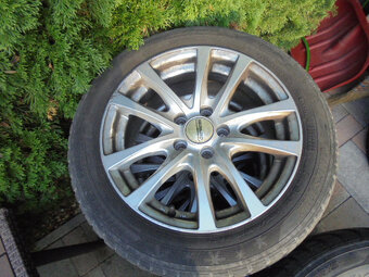Alu disky Škoda 5x100, pneu 215/45 R16 č.12d - 12