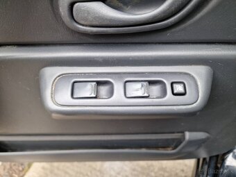 Suzuki Jimny 1.3i 63 kW 4x4 AC - 12