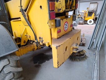 CATERPILLAR TH 63 4X4 - 12