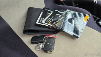 Opel Corsa 1.4 16V Cosmo - 12