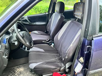 Opel Astra 1.4 16V - 12