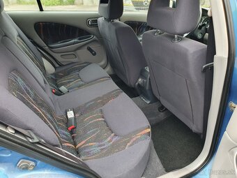 Nissan Almera 1,5 - 12