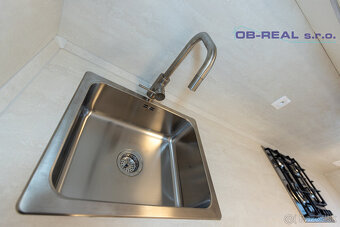 Predaj kompletne rekonštr. 2izb bytu 62m2 na zvýš. prízemí - 12