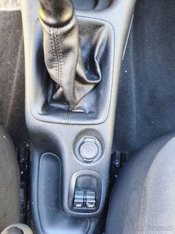 peugeot 206+ 1,4 55kw - 12