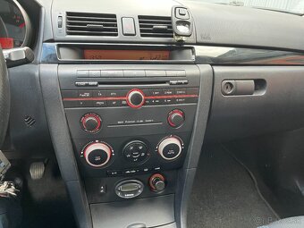 Mazda 3 1.6i. 77kW rok 2005 - 12