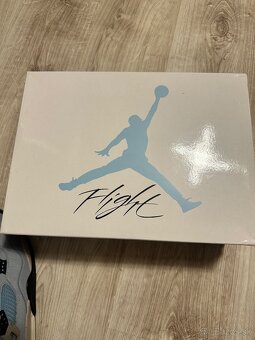 Jordan 4 University Blue - 12