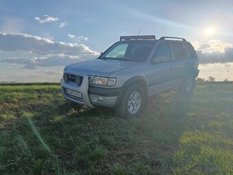 Opel Frontera, ročník 2003..karoséria AC kombi. 2,2 Tdi 88kw - 12