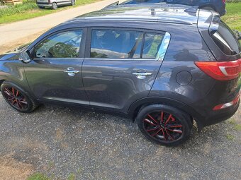 SPORTAGE - 12