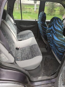 Kia Sportage 2.0 td - 12