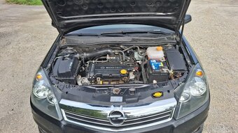 Opel astra H 1.4 16v - 12