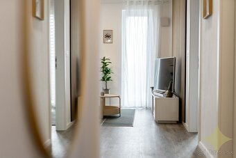 Ponúkam na prenájom dvojizbový byt s garážovým státim v poly - 12