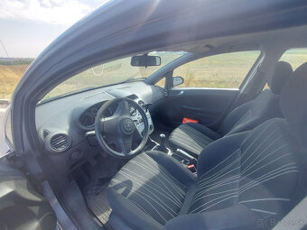 Opel Corsa 1.2 - 12