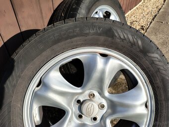 Subaru disky + Nokian Tyres Wetproof SUV 225/60 R17 - 12