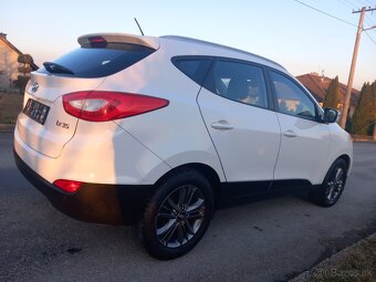 Hyundai Tucson ix35 ,1.6 benzin - 12