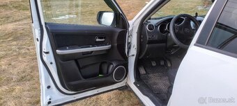 Suzuki Grand Vitara r.v.2010 - 12