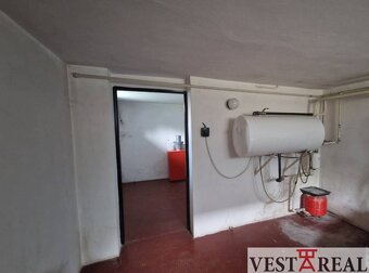Na predaj veľký rodinný dom s garážou pozemok 838 m2 Veľké K - 12