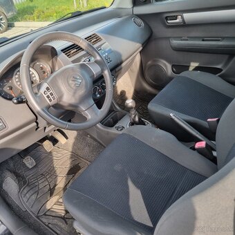 Suzuki Swift 1.3 ddis - 12