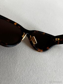 Slnecne okuliare MIU MIU - 12