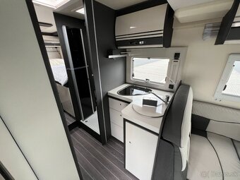 Ford 2.0 125kw Magis + 84XT Elite CI automat - 12