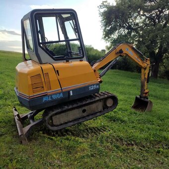 Pasovy bager Libra 125S - 12