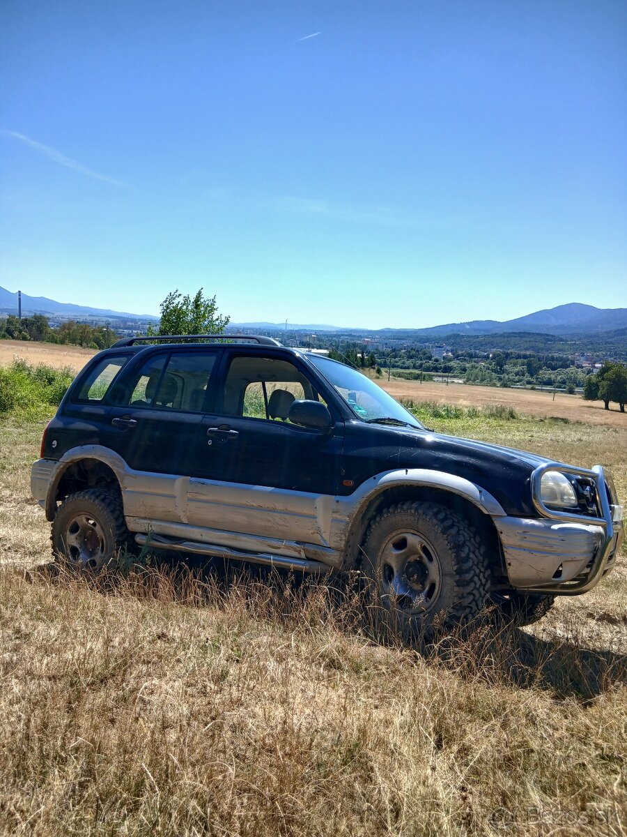 Suzuki Grand Vitara 2.5 V6 - 13