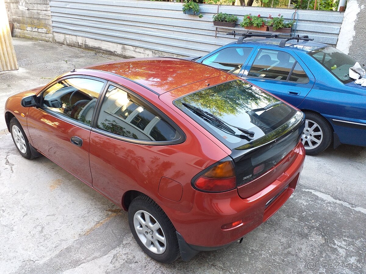 MAZDA 323 - 13