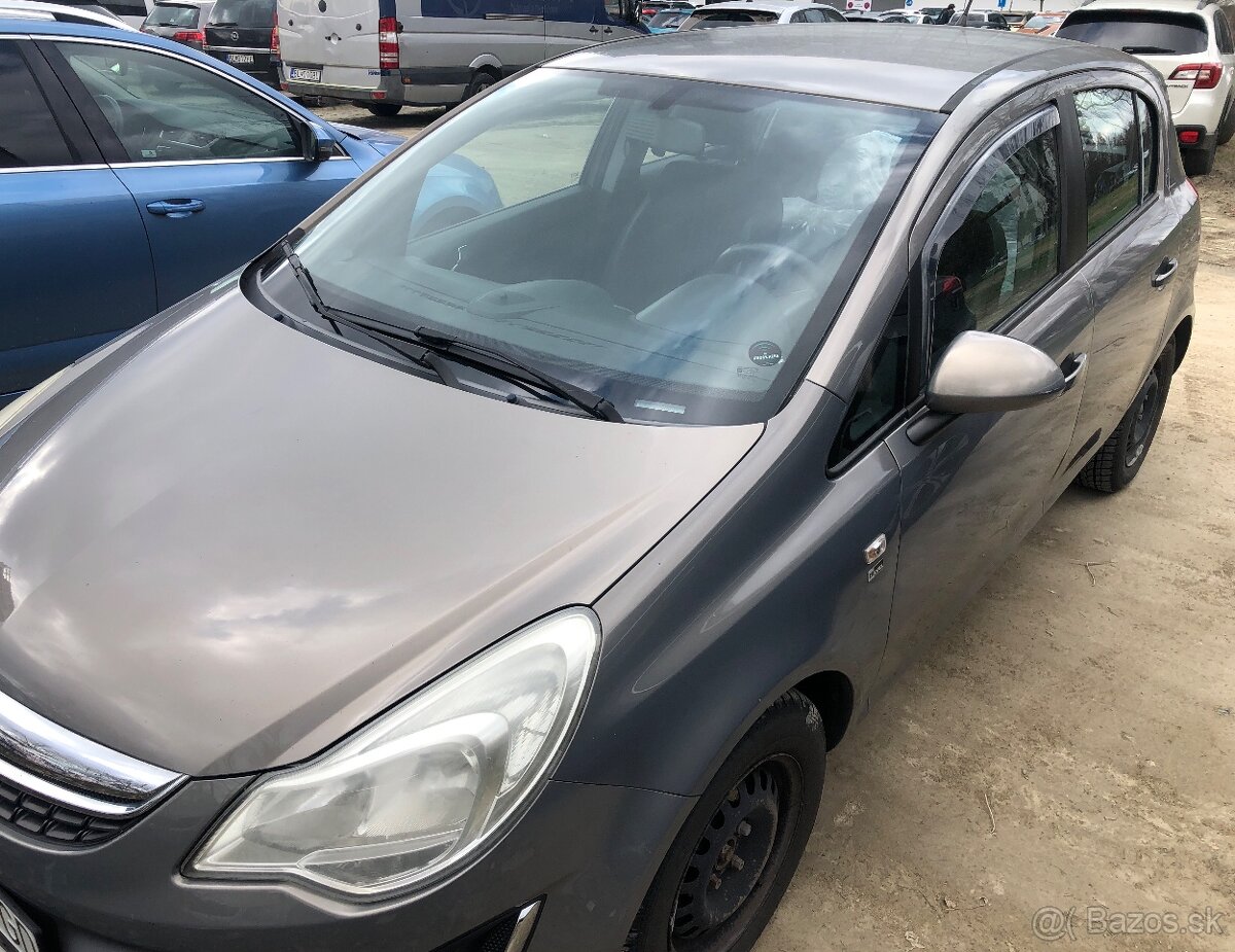 Opel corsa Automat 2013 1.4 i - 13