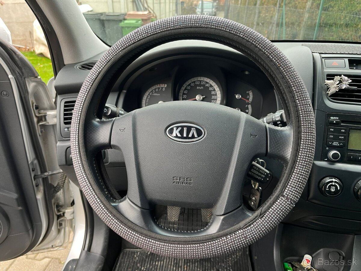 KIA Sportage 2.0 CVVT - 13