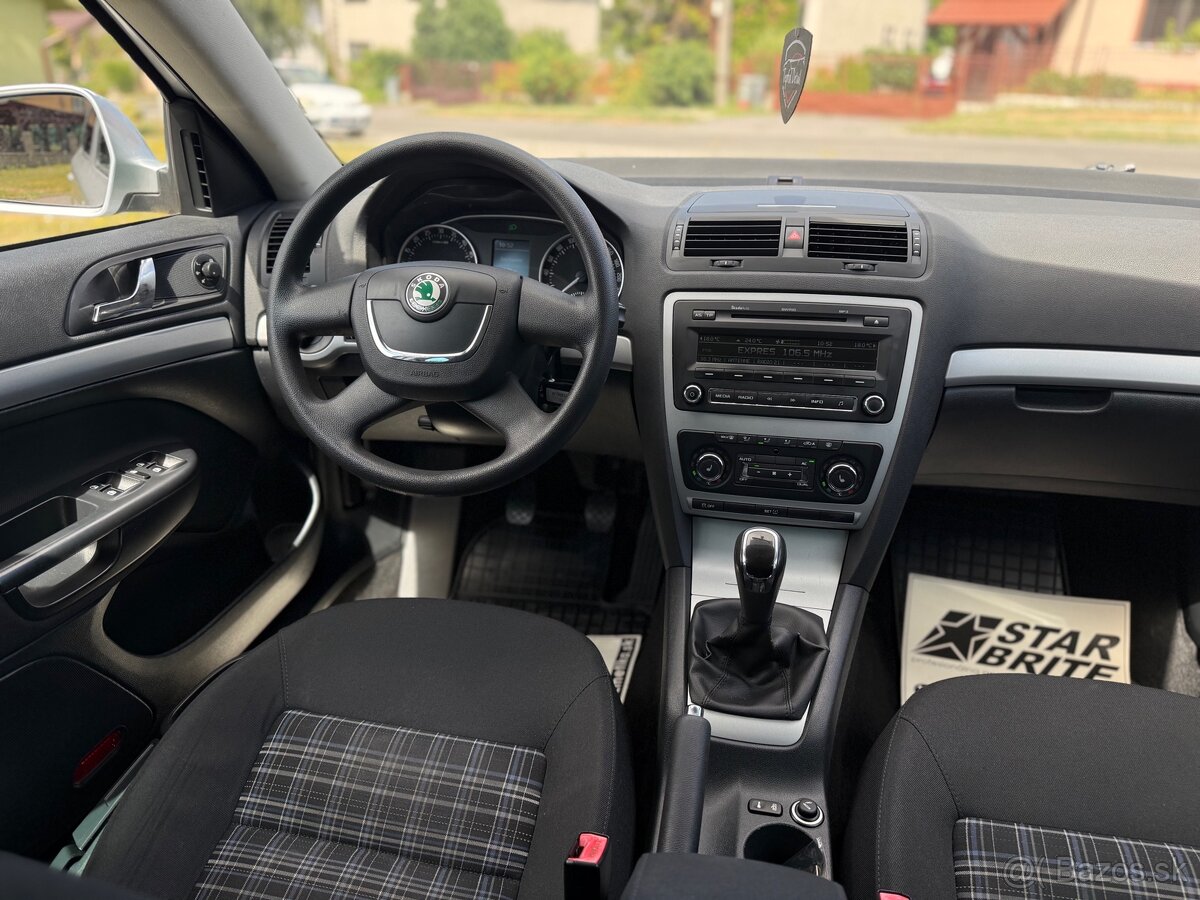 Škoda Octavia Combi 1.6 TDI Ambiente (2012, 168.000km) - 13