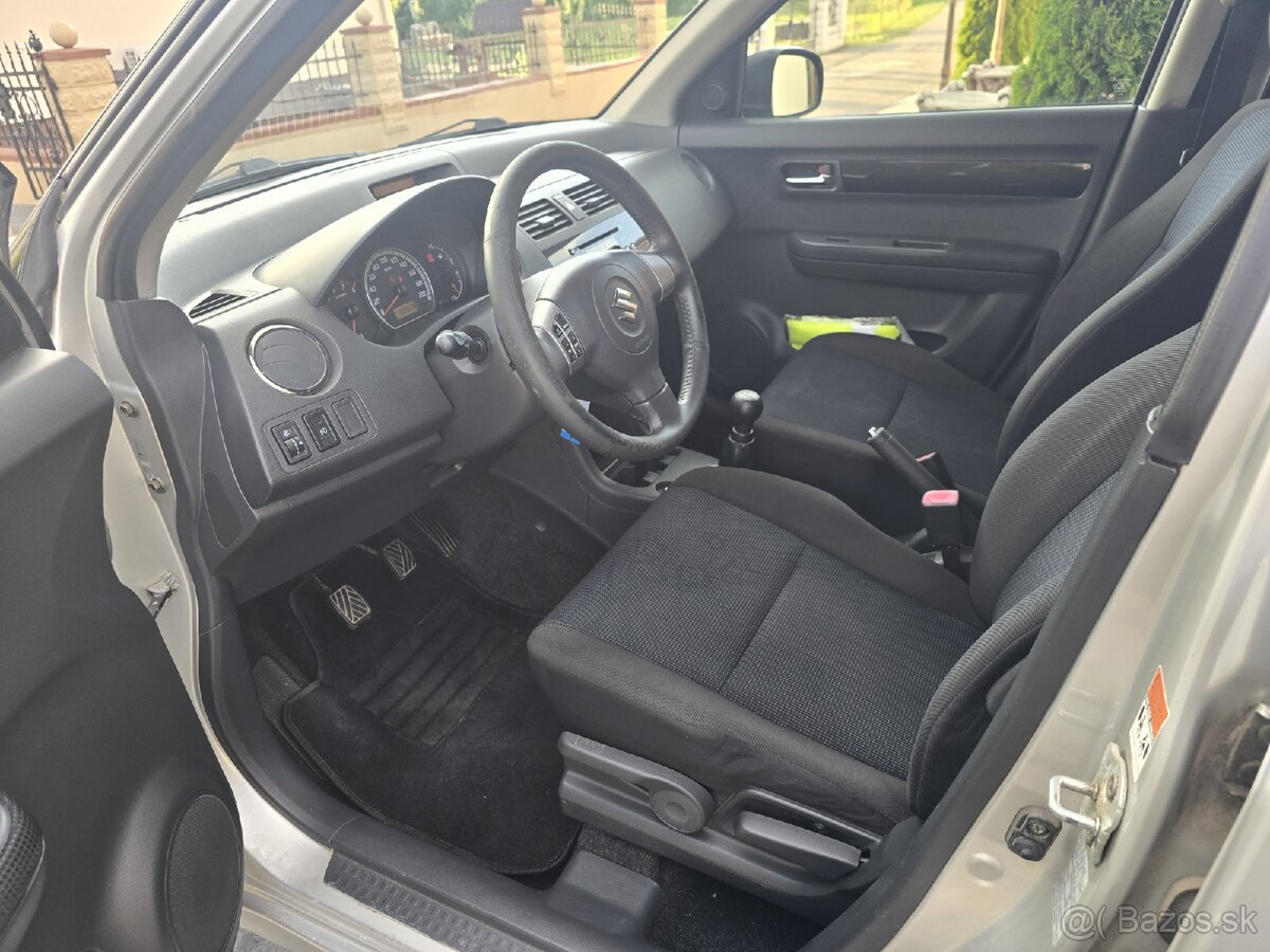 Predám Suzuki Swift 1.3 benzín 4x4 - 13