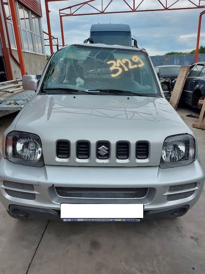 Suzuki Jimny 1,3i 62,5kw 69.500km - 13