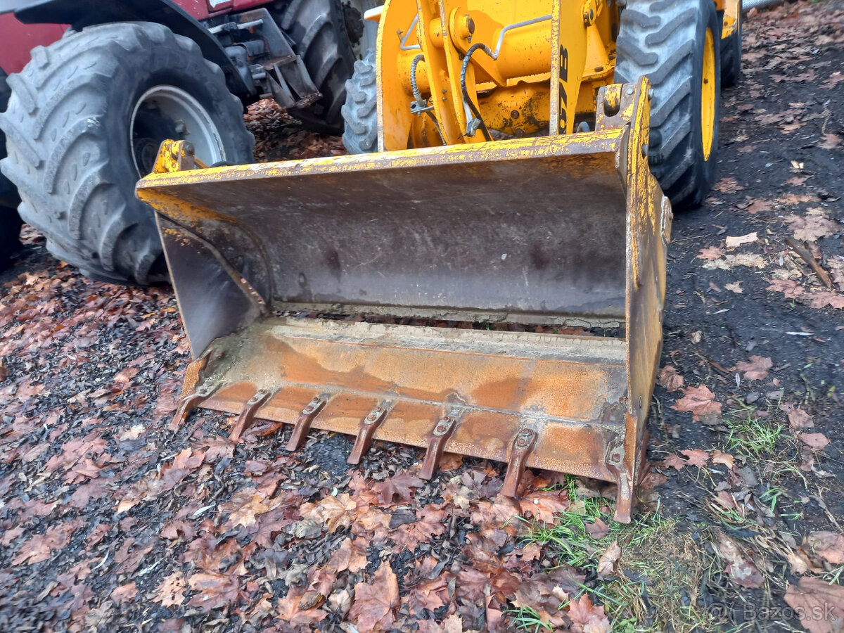 Kolový nakladač JCB 407 - 13