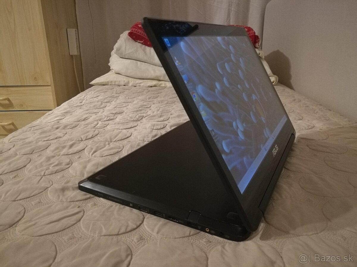 Asus. (2-v-1) konvertibilný notebook s dotykovým displejom. - 13