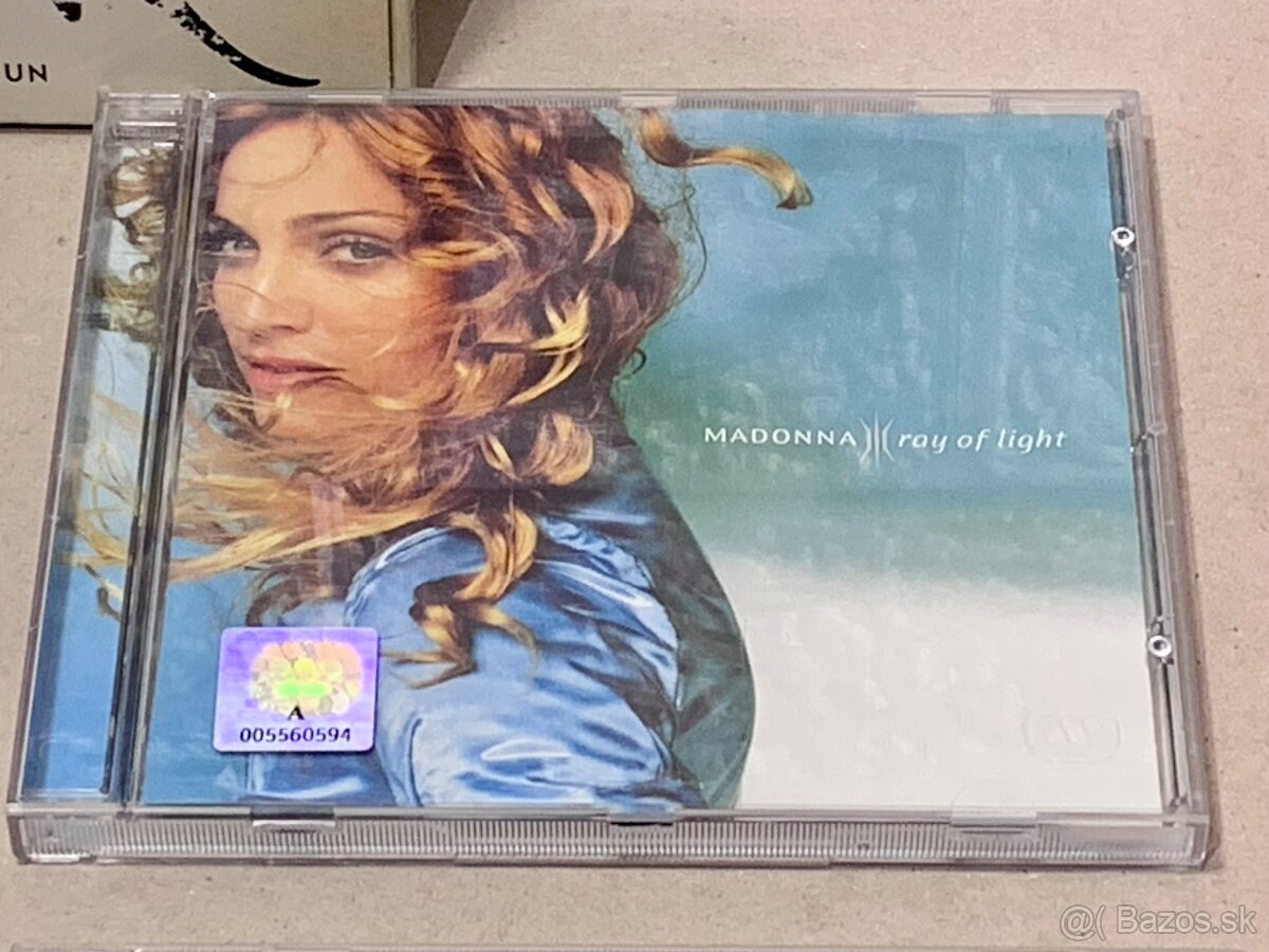 CD-čka; Eric Clapton. Madonna. U2. Elvis. CHER. The Rasmus. - 13