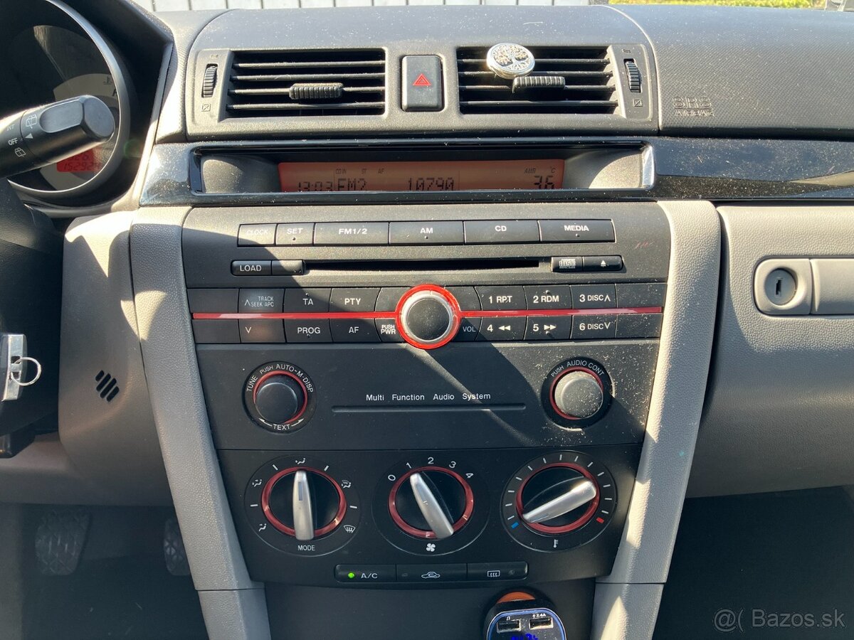 Mazda 3 1.4i Comfort 62 kW M5 - 13