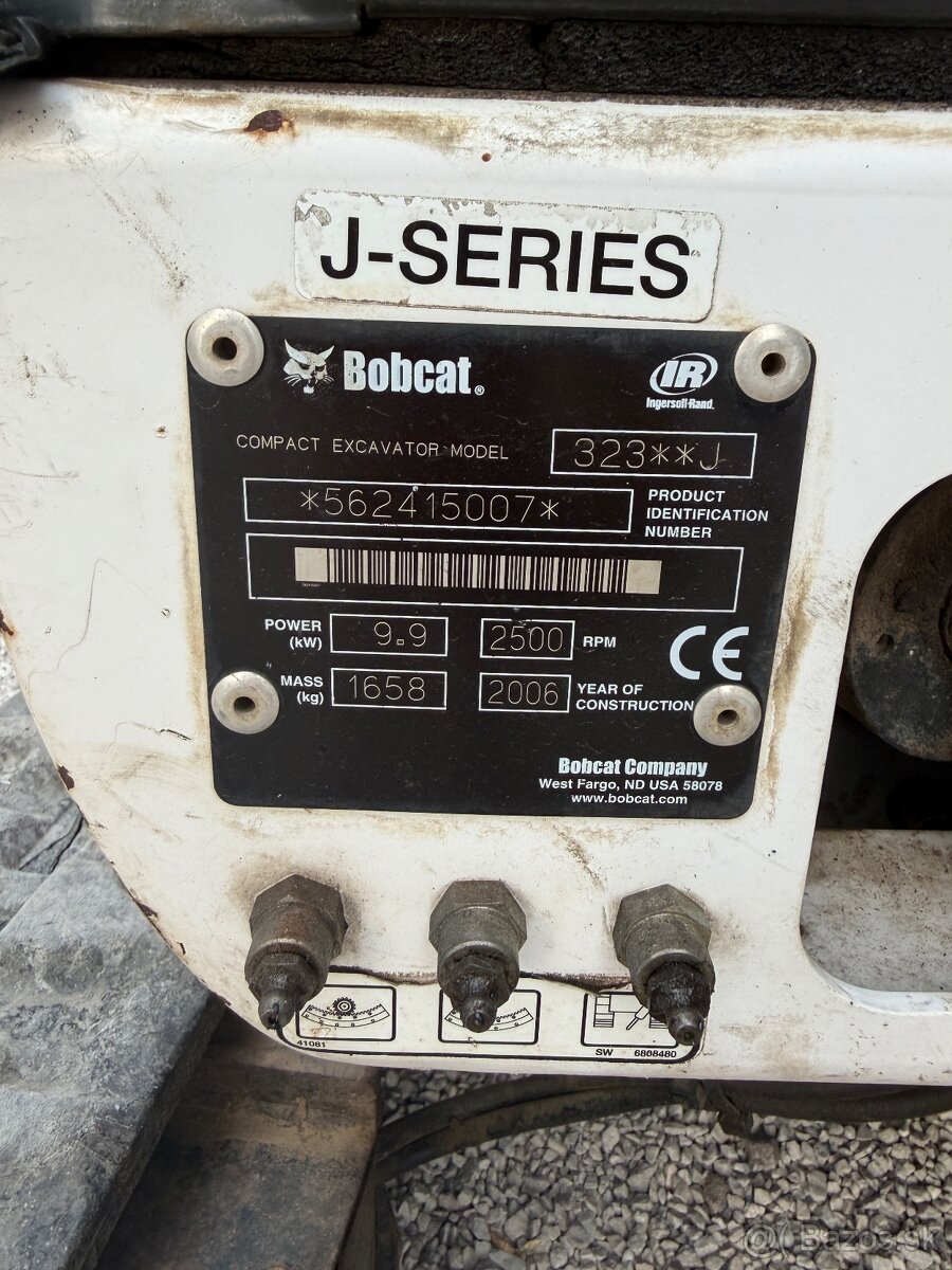 Minibager Bobcat 323 - 13